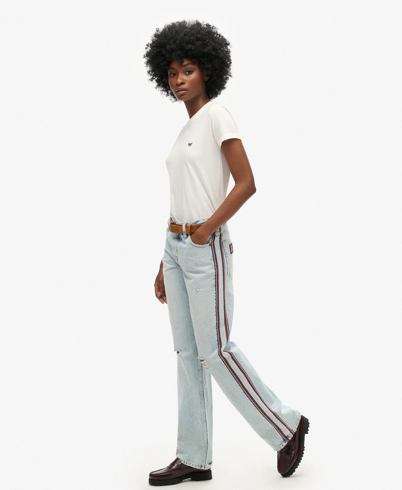 calça jeans de cintura média pernas largas e fita dupla face estilo vintage personalizado para a primavera.