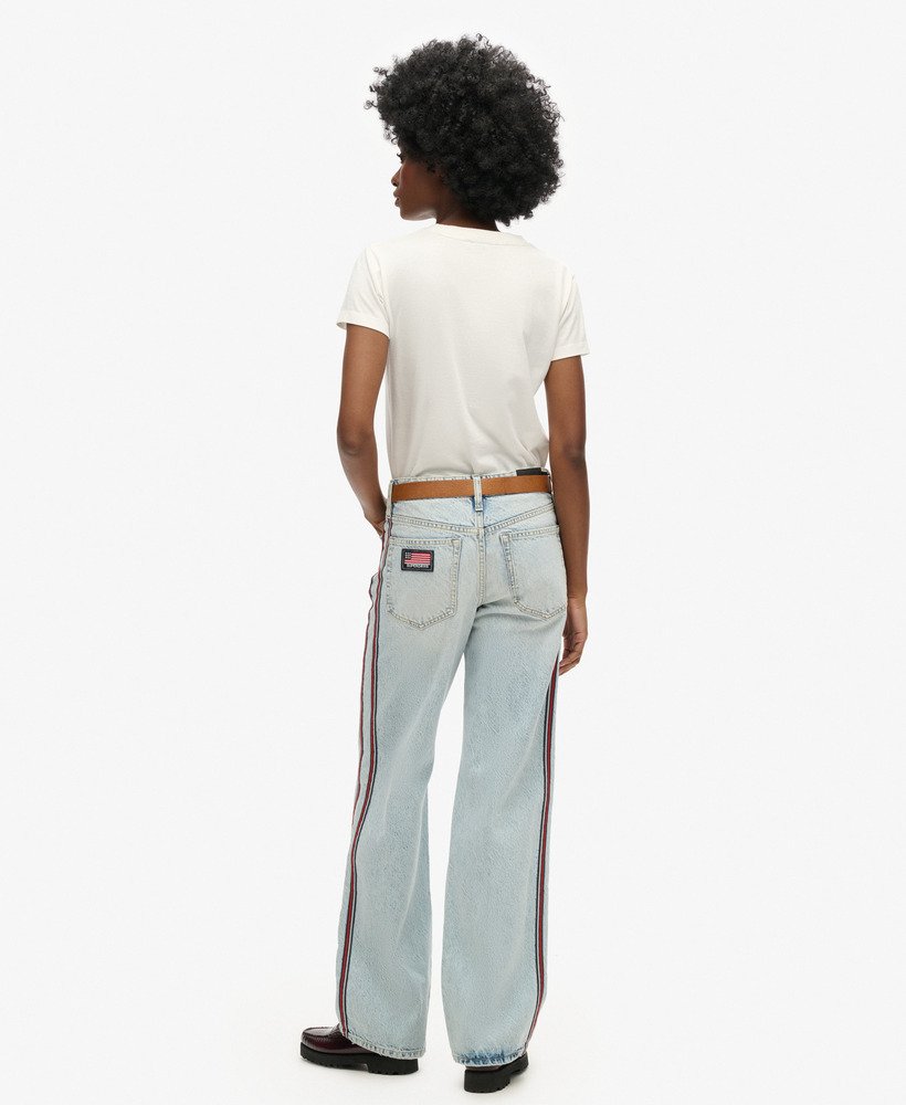 calça jeans de cintura média pernas largas e fita dupla face estilo vintage personalizado para a primavera.