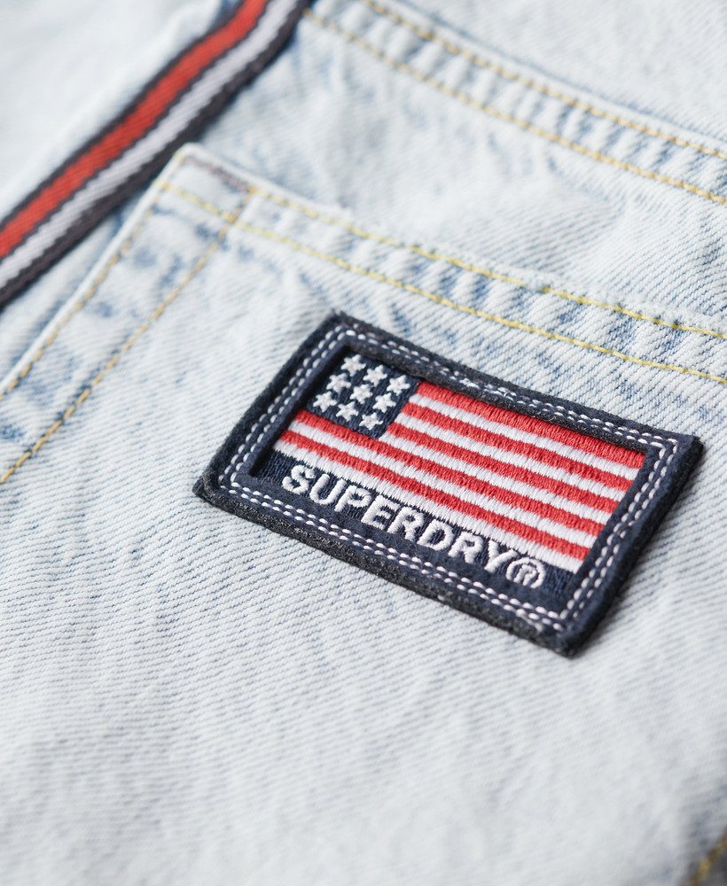 calça jeans de cintura média pernas largas e fita dupla face estilo vintage personalizado para a primavera.