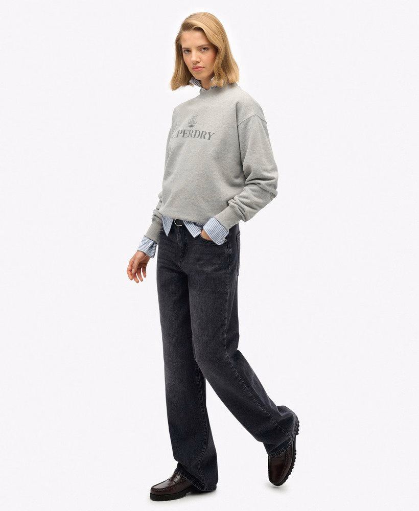 Calça jeans de algodão orgânico, cintura média e pernas largas.
