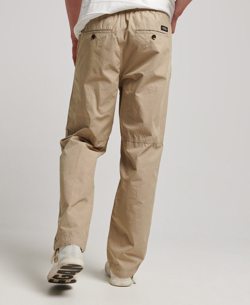 calça de moletom trançada na cor marrom areia do cânion