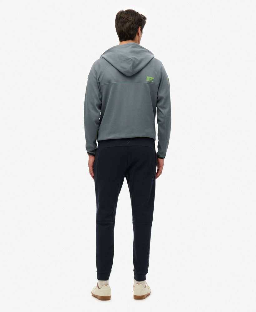 calça de moletom sport tech logo tapered na cor azul marinho eclipse