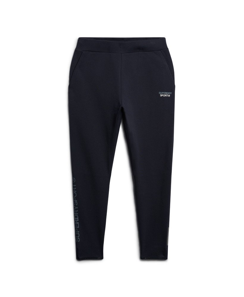 calça de moletom sport tech logo tapered na cor azul marinho eclipse