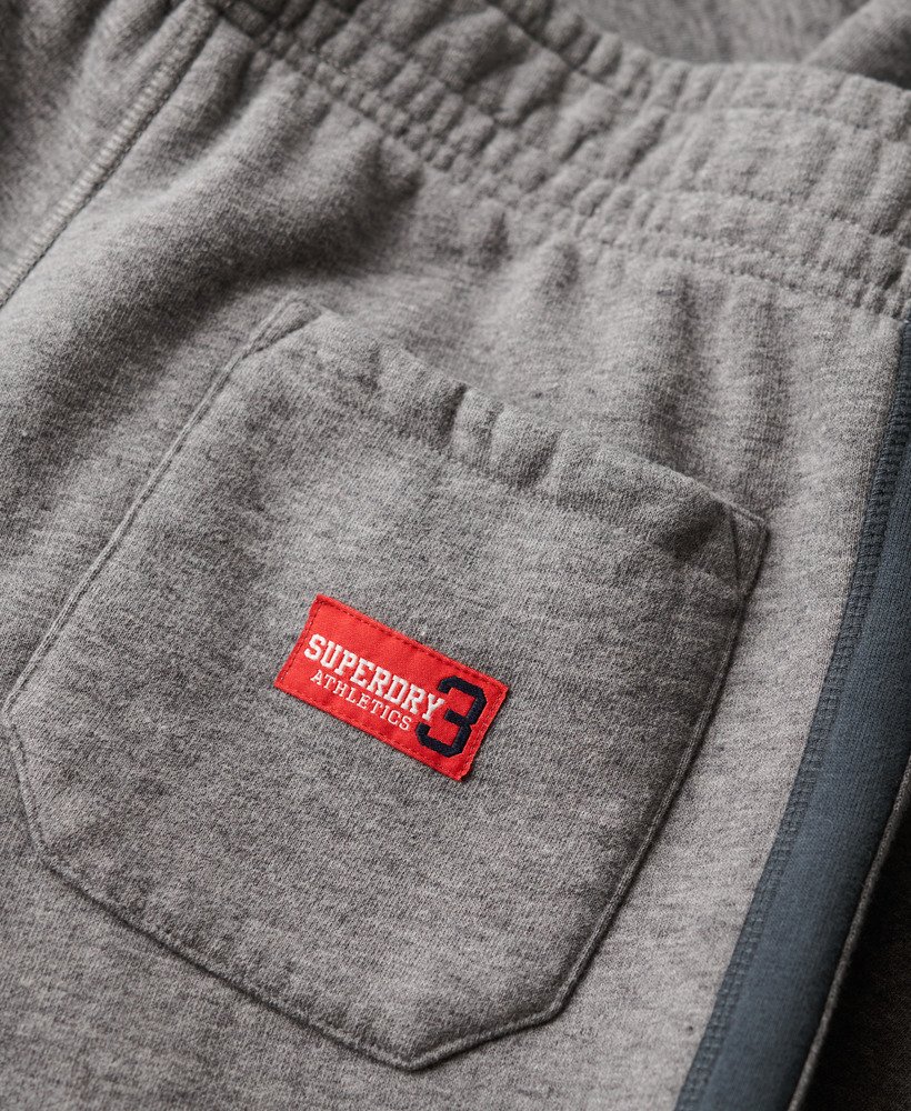 calça jogger reta essential logo em cinza carbono mescladoazul eclipse