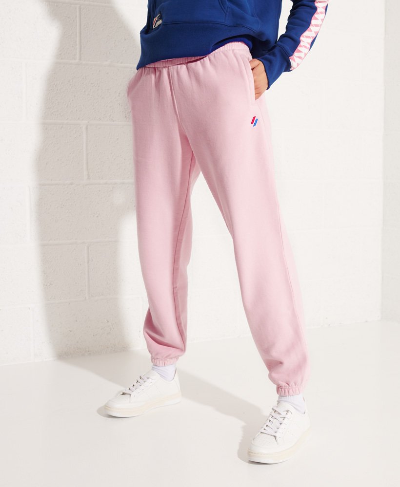 calça de moletom code essential em algodão orgânico na cor rosa-claro.