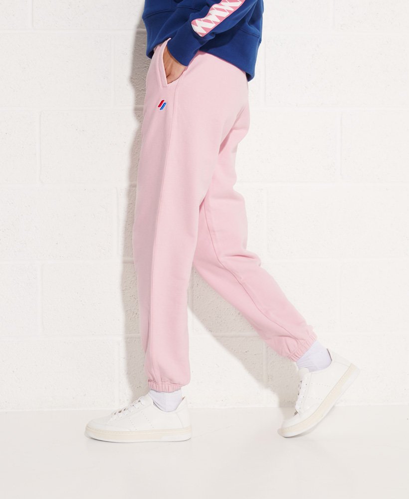 calça de moletom code essential em algodão orgânico na cor rosa-claro.