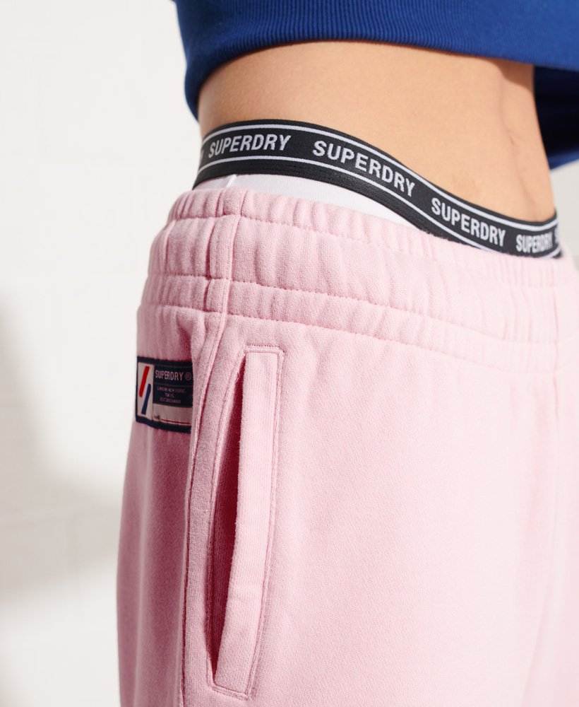 calça de moletom code essential em algodão orgânico na cor rosa-claro.