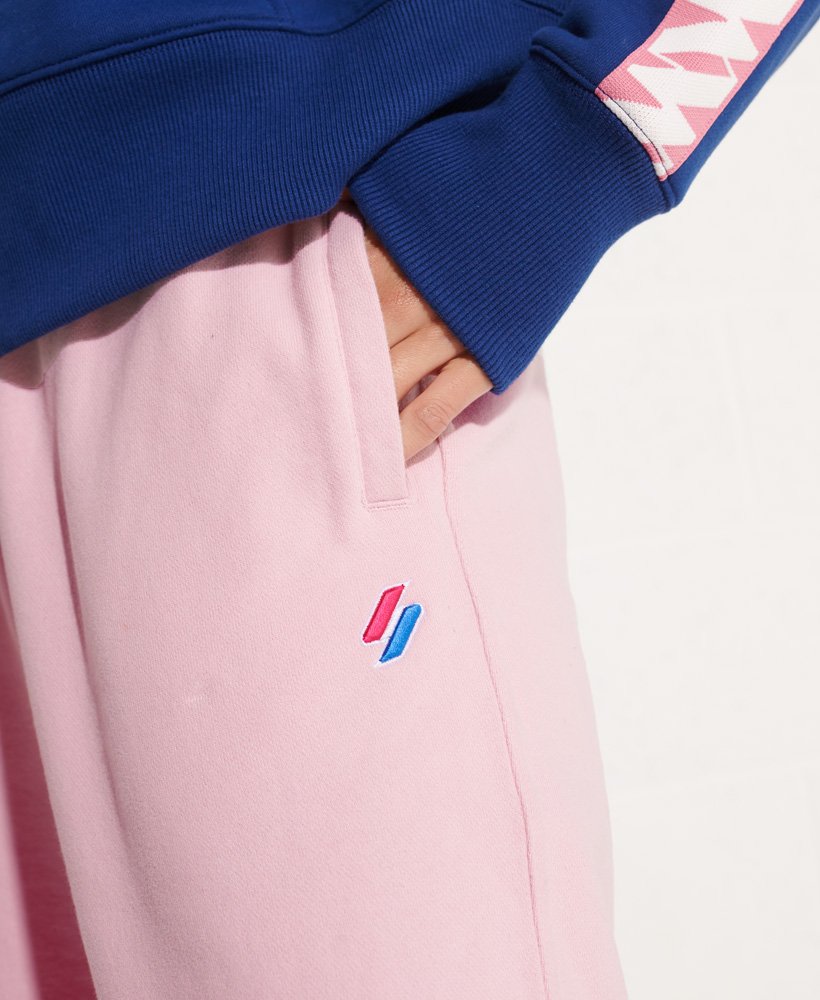 calça de moletom code essential em algodão orgânico na cor rosa-claro.