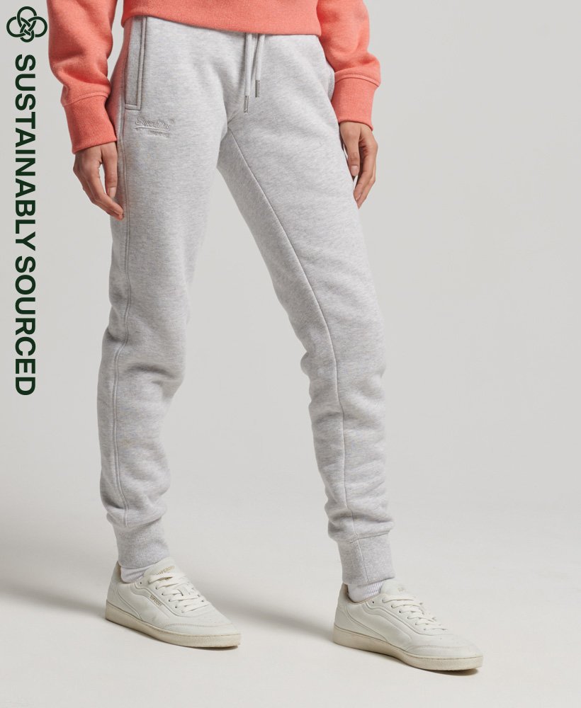 calça de moletom vintage em algodão orgânico com logo bordado na cor cinza mesclado glaciar.