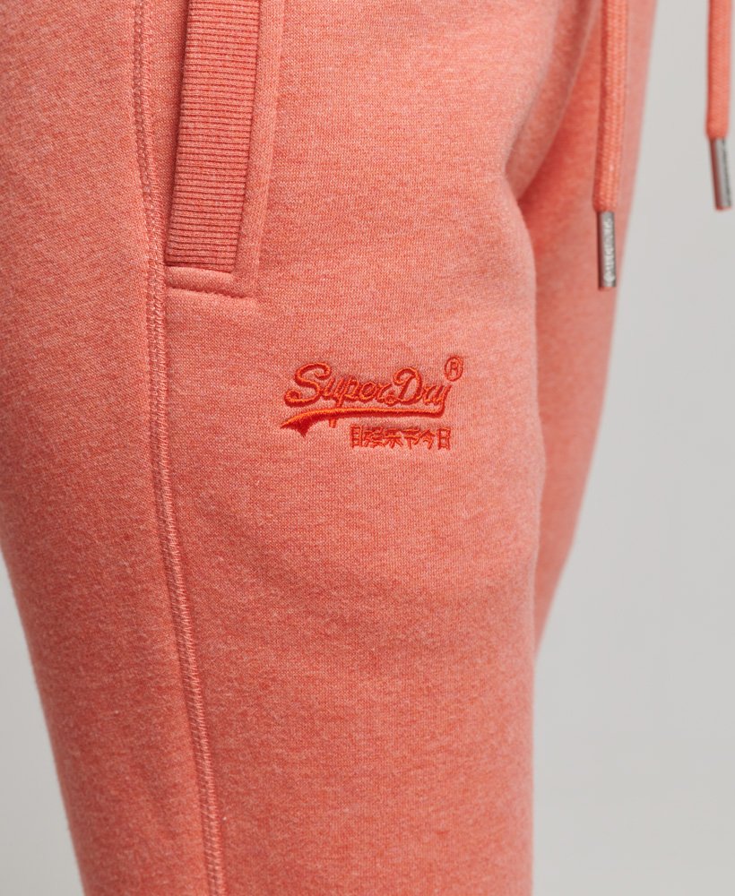 calça de moletom essential logo em algodão orgânico na cor la coral mesclado