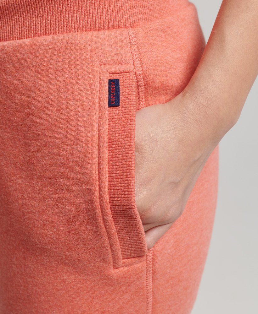 calça de moletom essential logo em algodão orgânico na cor la coral mesclado