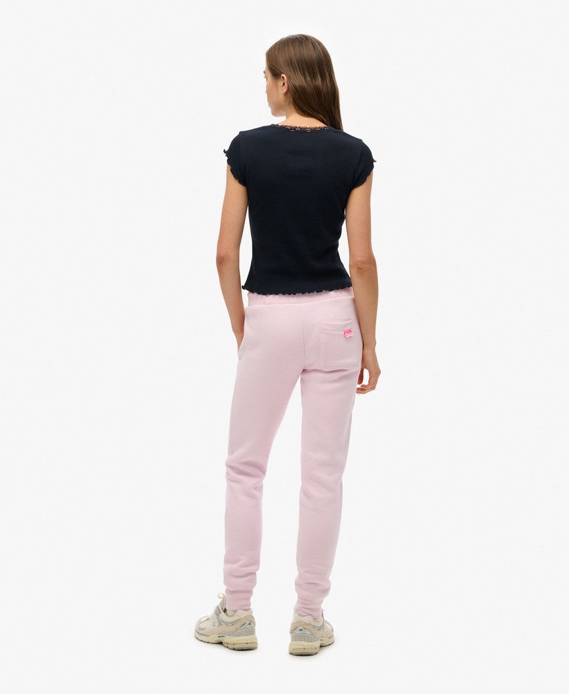 calças de treino para atletismo na cor rosa