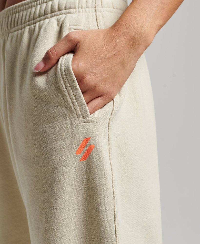 calça de treino core sports na cor bege pelicano