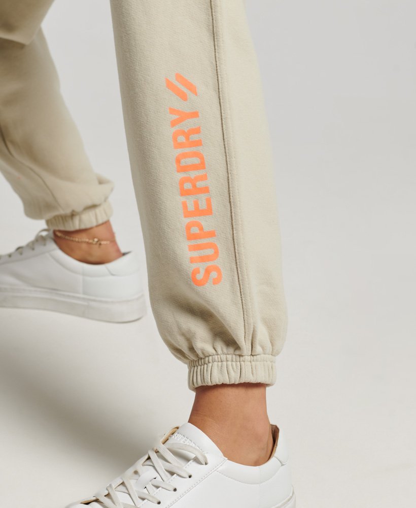 calça de treino core sports na cor bege pelicano