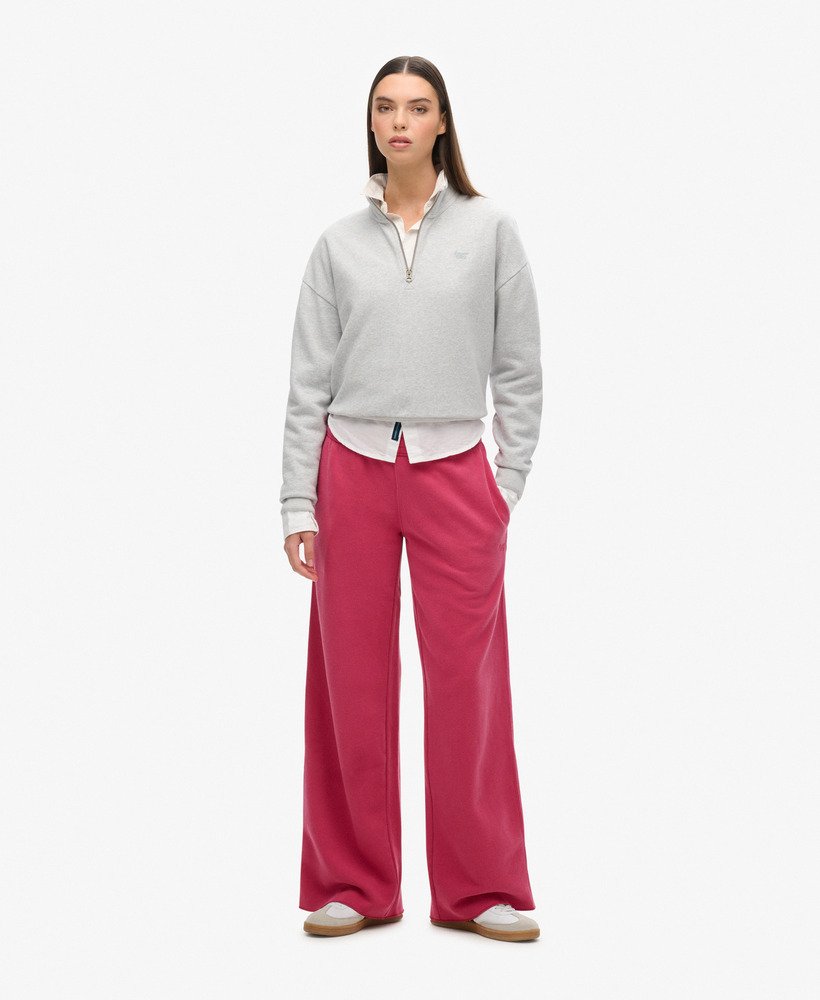 calça jogger de pernas largas wash na cor rosa beterraba