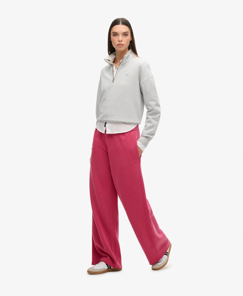 calça jogger de pernas largas wash na cor rosa beterraba