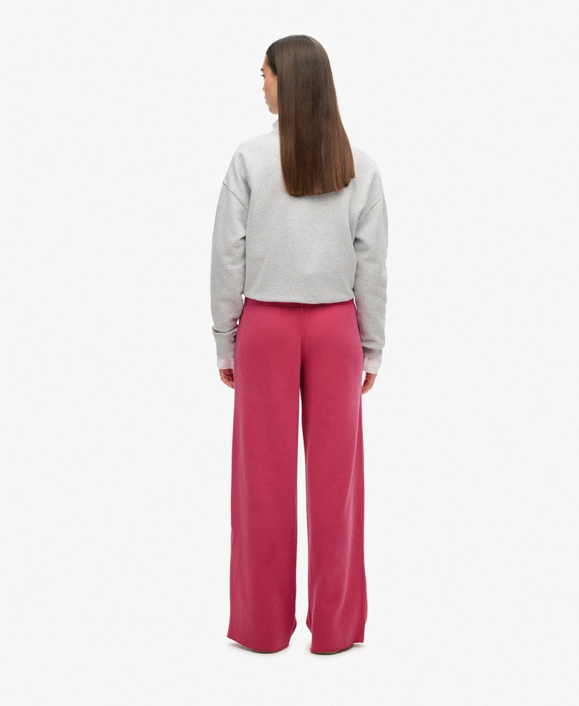 calça jogger de pernas largas wash na cor rosa beterraba