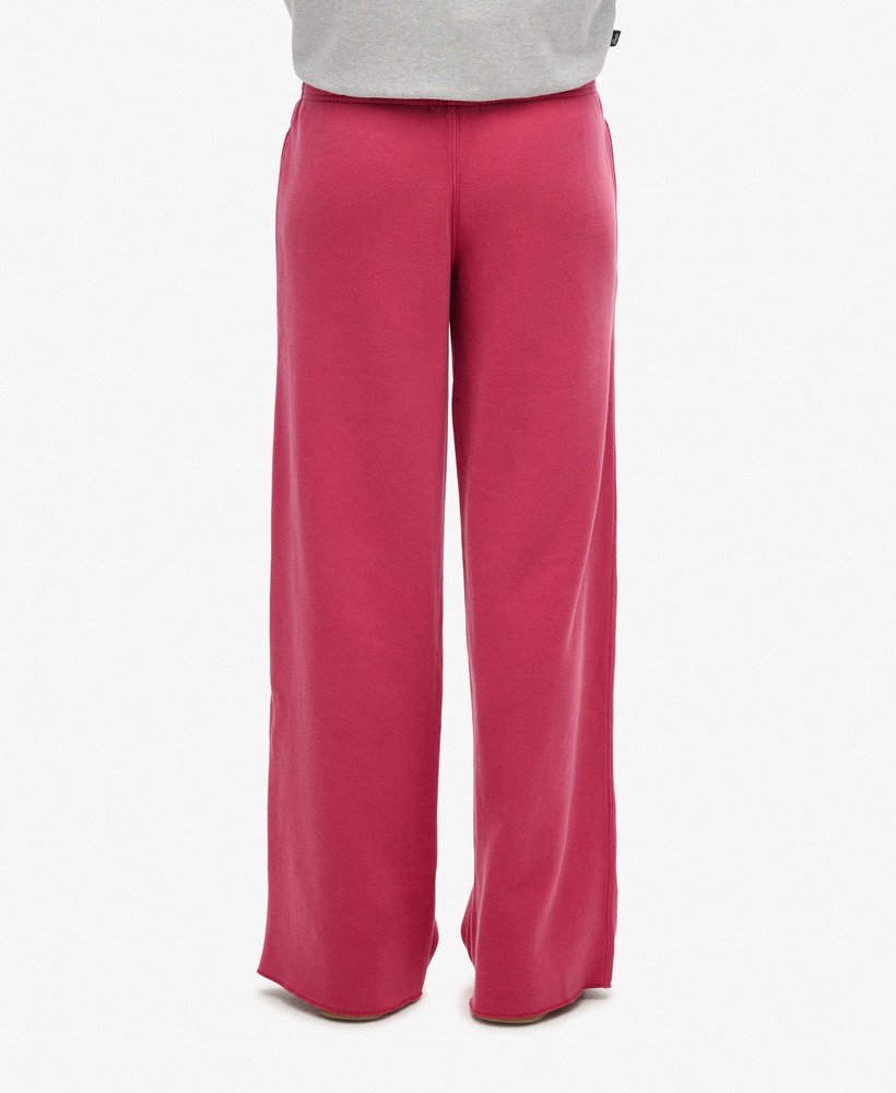 calça jogger de pernas largas wash na cor rosa beterraba