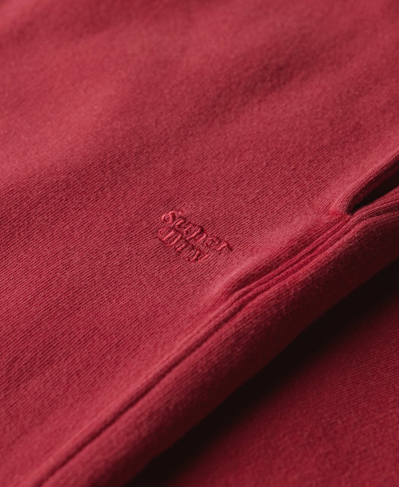 calça jogger de pernas largas wash na cor rosa beterraba