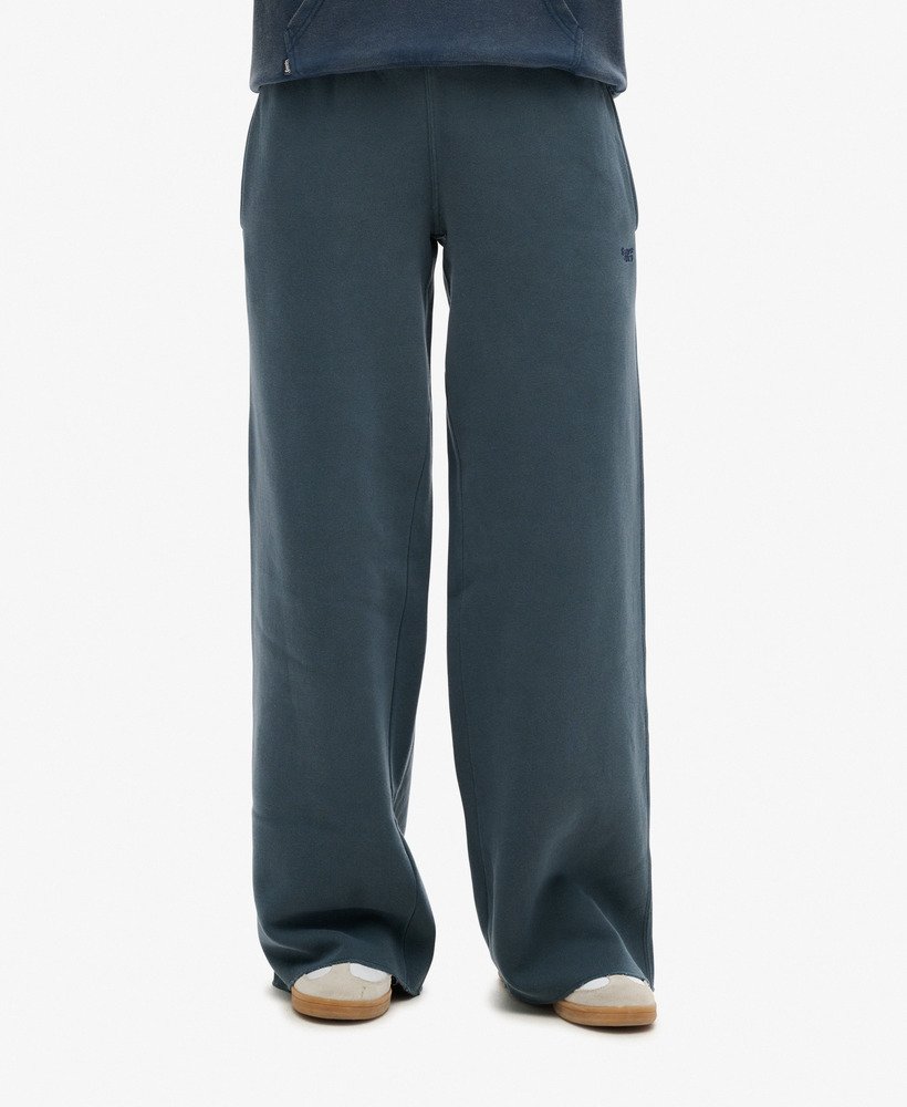 calça jogger de pernas largas wash na cor azul marinho eclipse