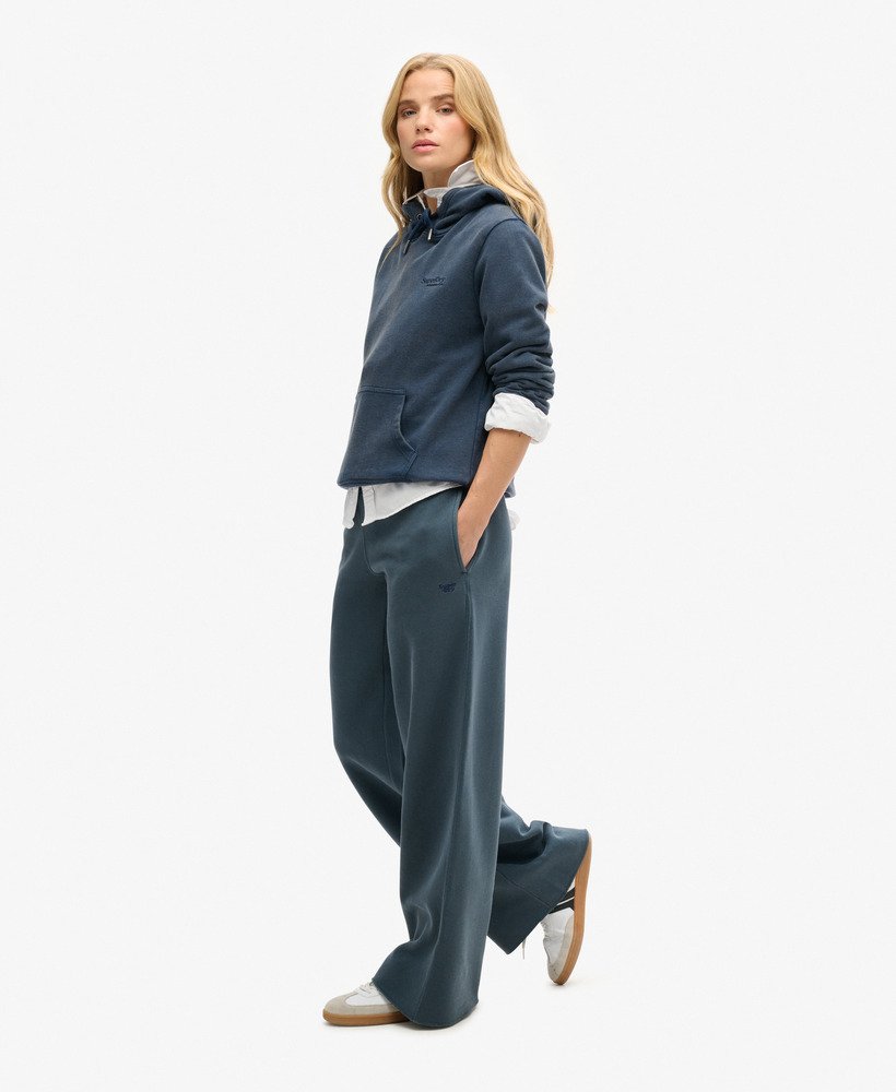 calça jogger de pernas largas wash na cor azul marinho eclipse
