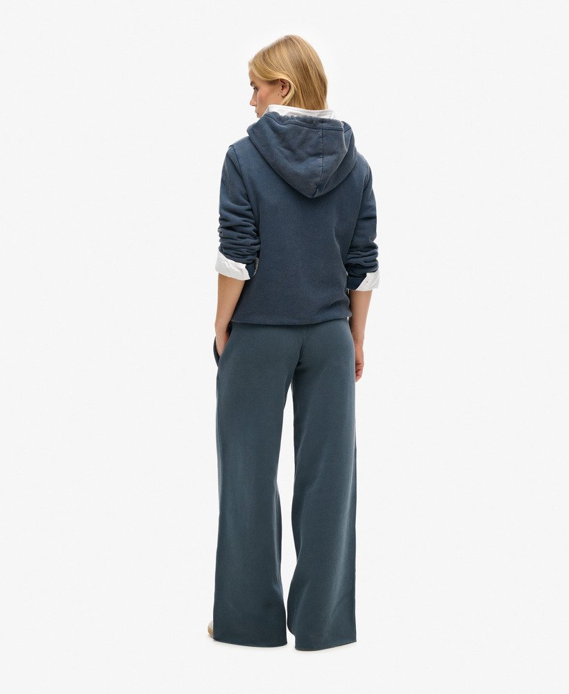 calça jogger de pernas largas wash na cor azul marinho eclipse