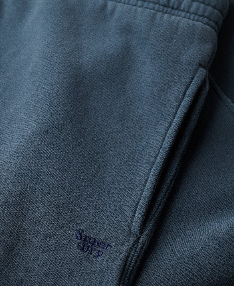 calça jogger de pernas largas wash na cor azul marinho eclipse