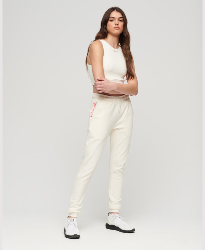 calça jogger slim da code tech na cor branco arroz
