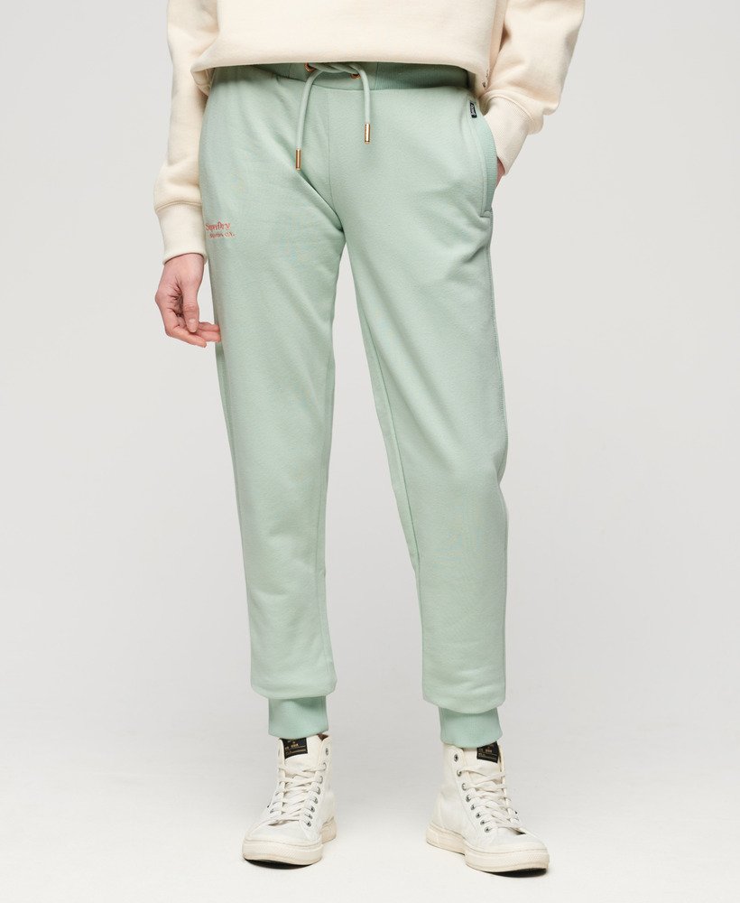 calça de moletom essential logo na cor verde surf spray.