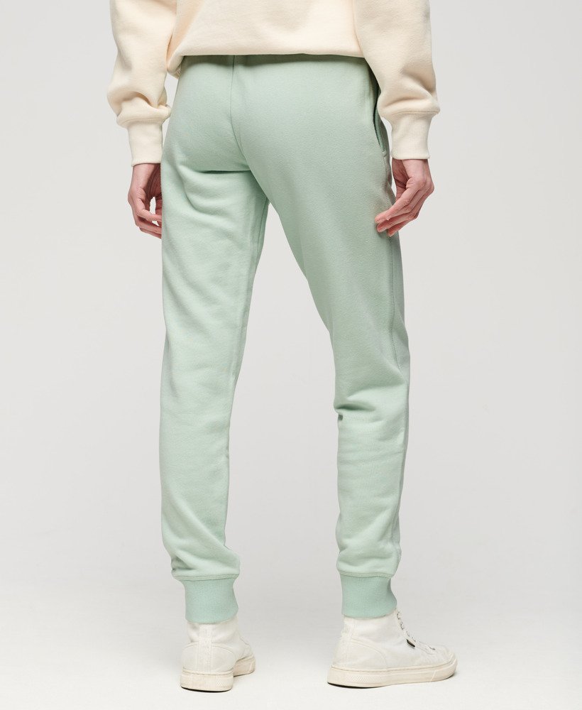 calça de moletom essential logo na cor verde surf spray.
