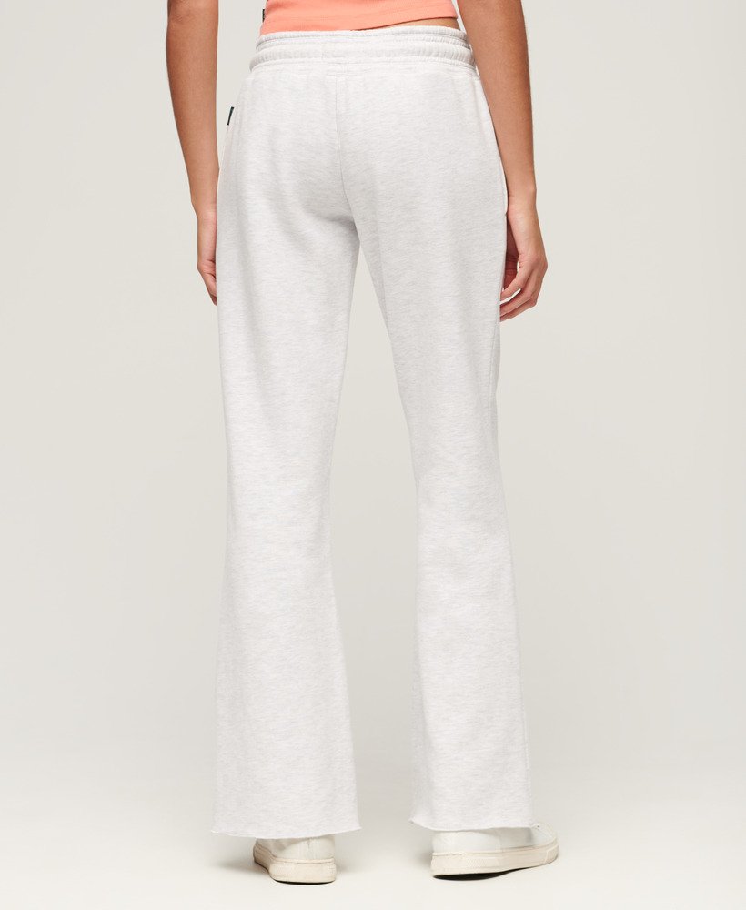calça jogger flare de cintura baixa com logo vintage em neon na cor ice marl