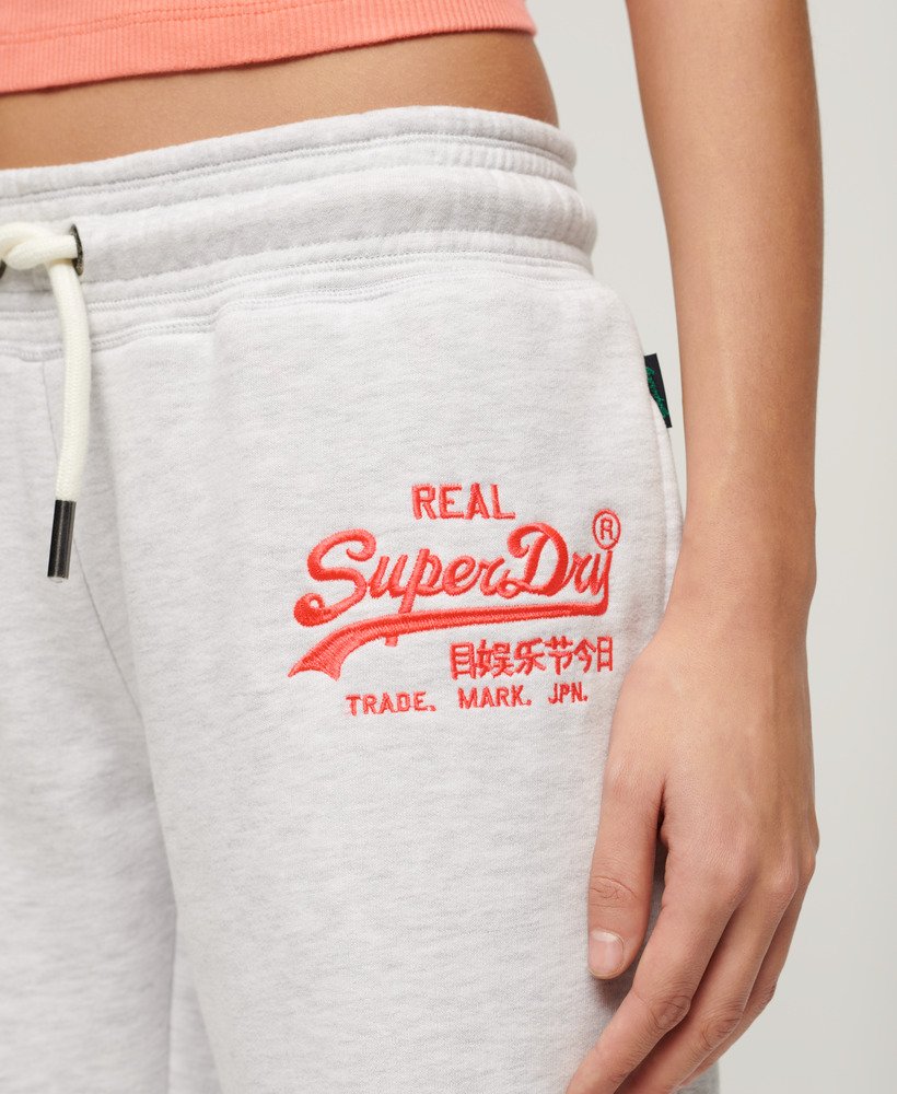 calça jogger flare de cintura baixa com logo vintage em neon na cor ice marl
