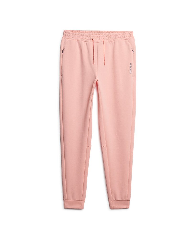 calça de moletom sports tech slim na cor rosa pêssego perolado