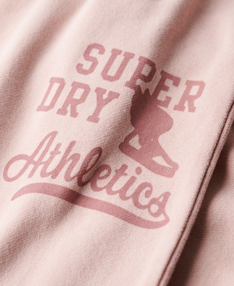 calça jogger vintage washed graphic da athletic essentials em rosa claro