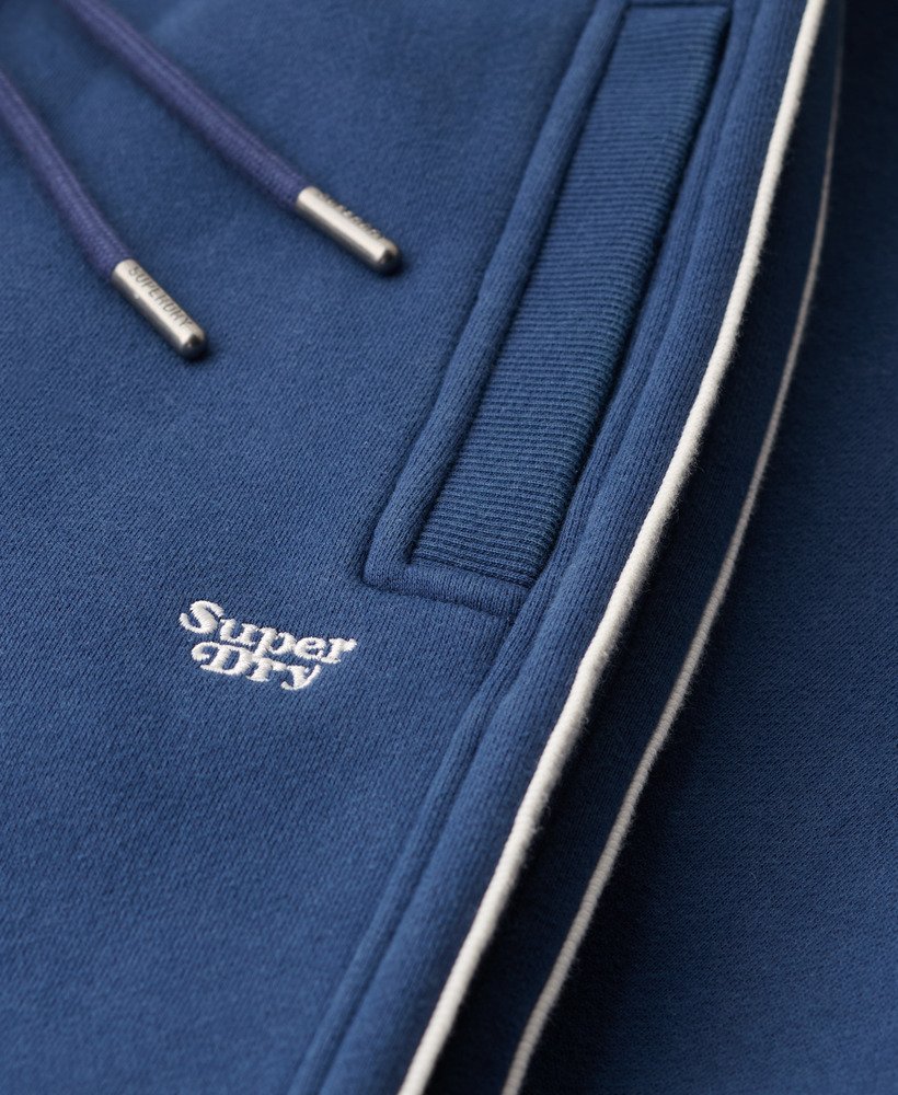 calça jogger reta essential logo na cor azul marinho
