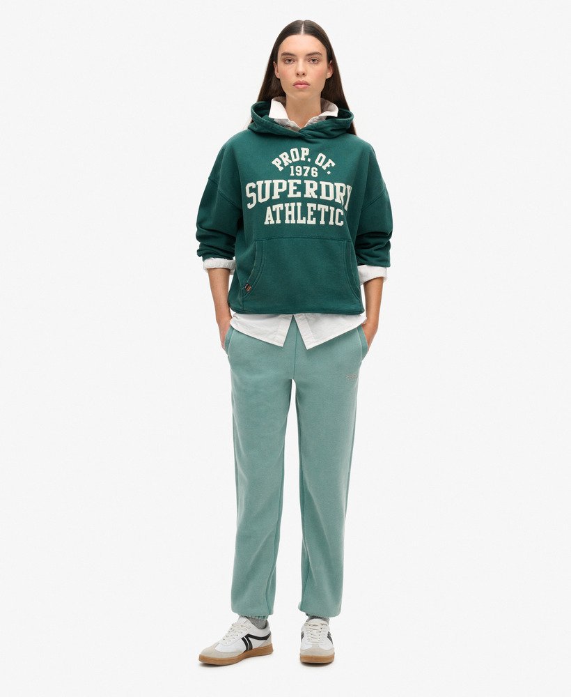 calça jogger essential com punho e logo na cor azul petróleo