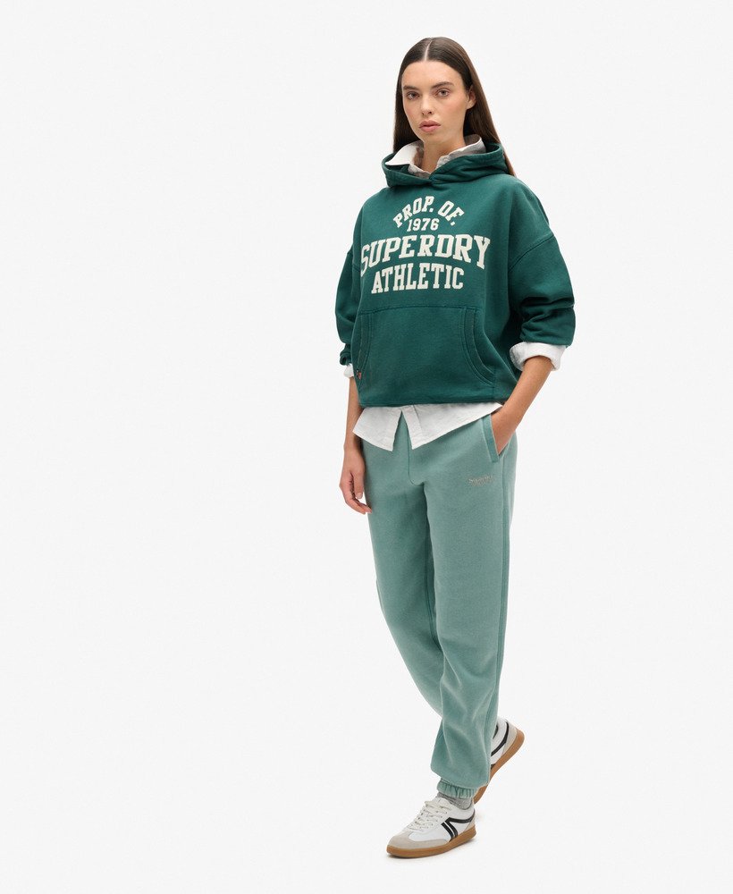calça jogger essential com punho e logo na cor azul petróleo