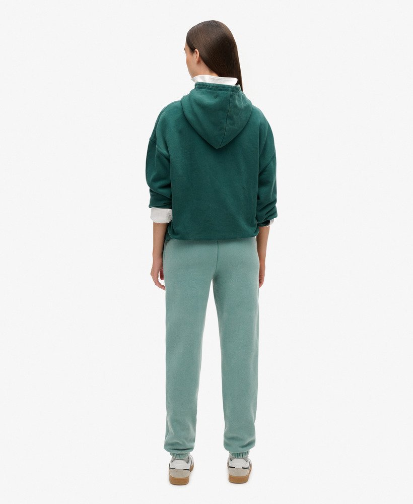calça jogger essential com punho e logo na cor azul petróleo