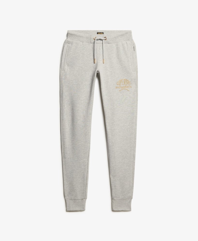 calça jogger slim luxe com logo metálico na cor bege mesclado pedra-pumice