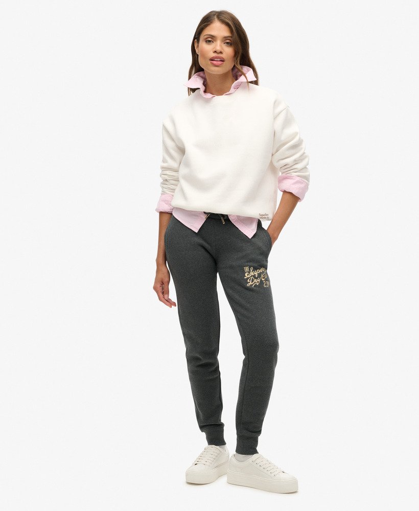 calça de moletom slim luxe metallic logo na cor near black heather