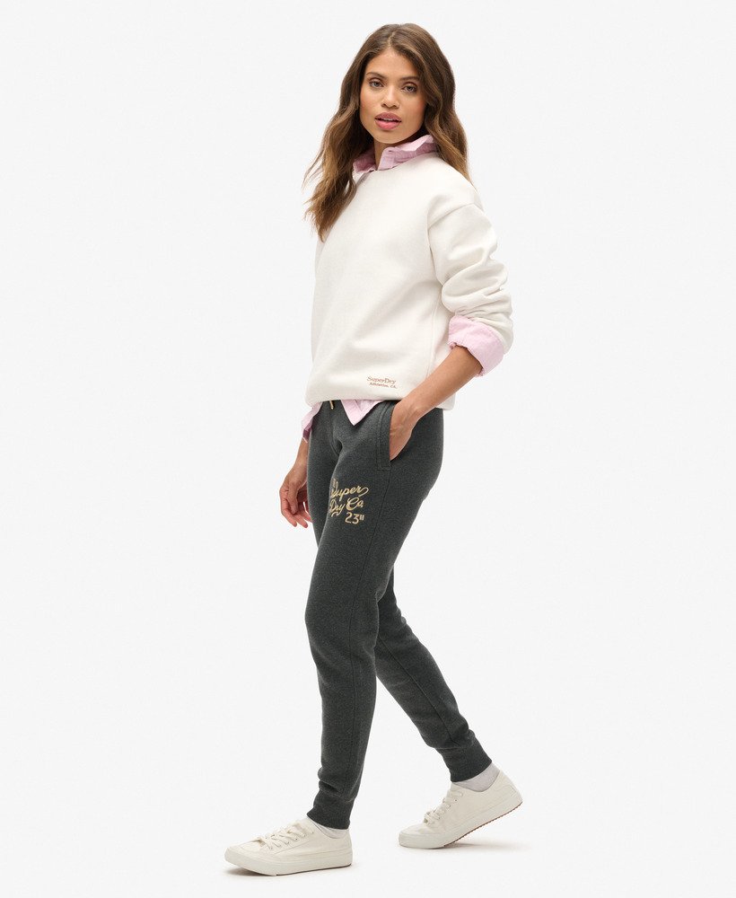 calça de moletom slim luxe metallic logo na cor near black heather