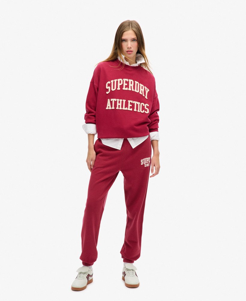 calça jogger boyfriend athletic essentials na cor vermelho bordô