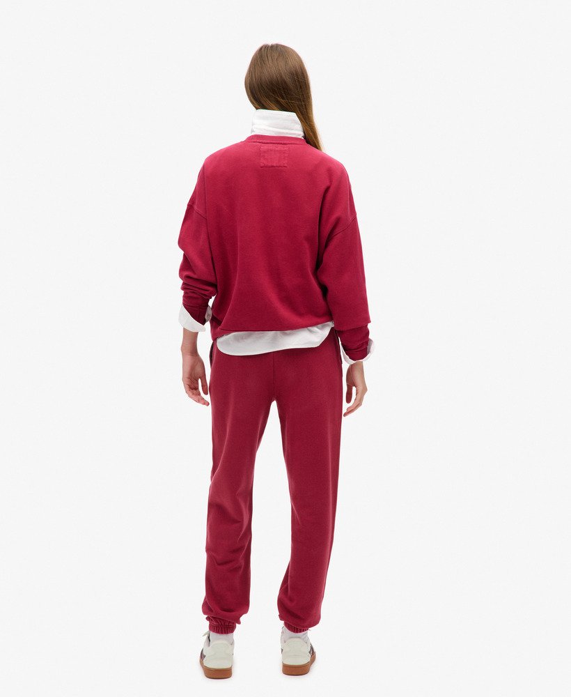 calça jogger boyfriend athletic essentials na cor vermelho bordô