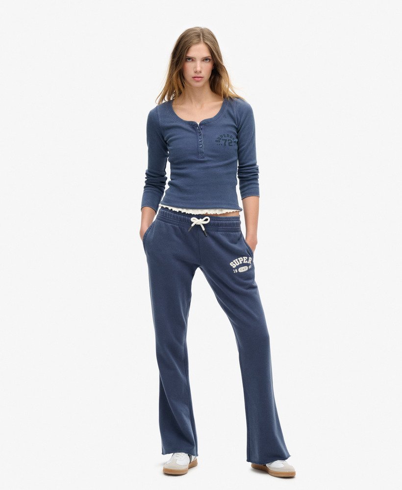 calça jogger flare de cintura baixa athletic essentials na cor azul marinho