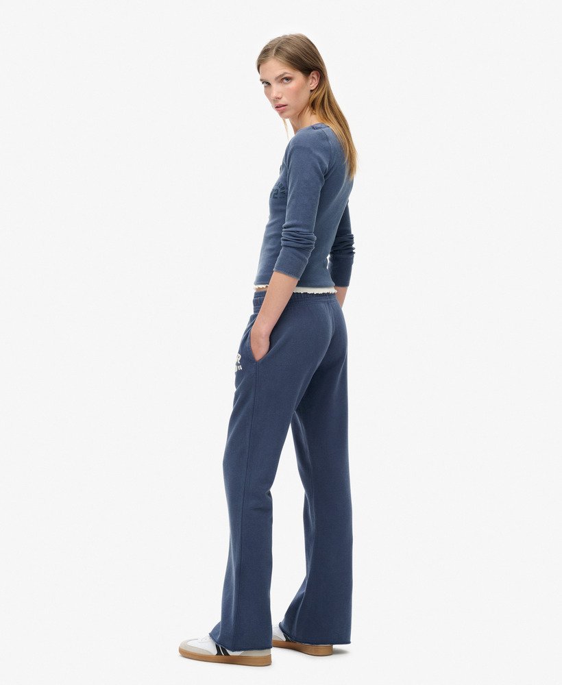 calça jogger flare de cintura baixa athletic essentials na cor azul marinho