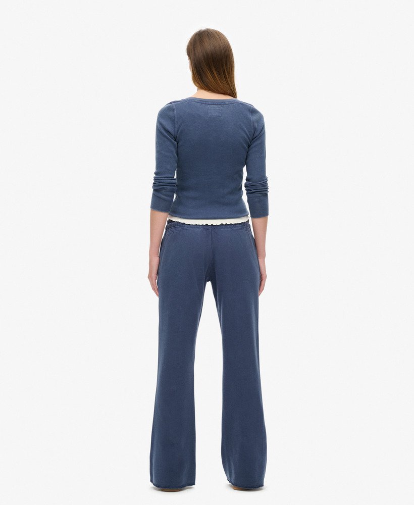 calça jogger flare de cintura baixa athletic essentials na cor azul marinho