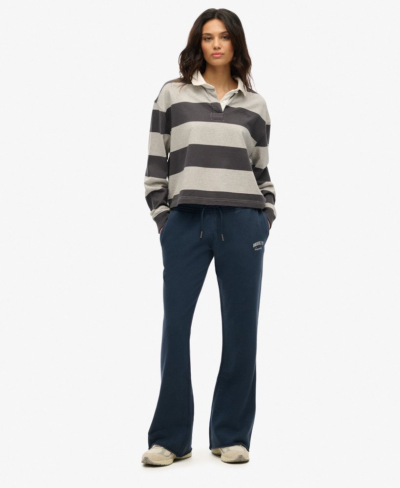 calça jogger flare de cintura baixa athletic essentials na cor azul marinho intenso