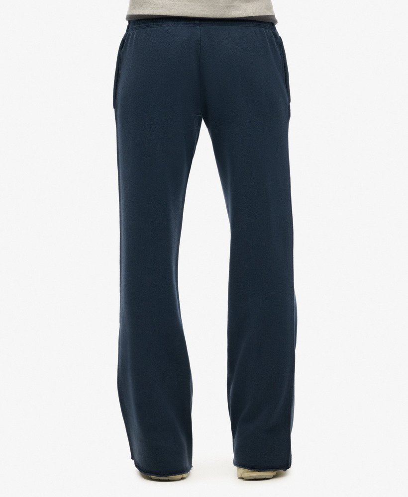 calça jogger flare de cintura baixa athletic essentials na cor azul marinho intenso