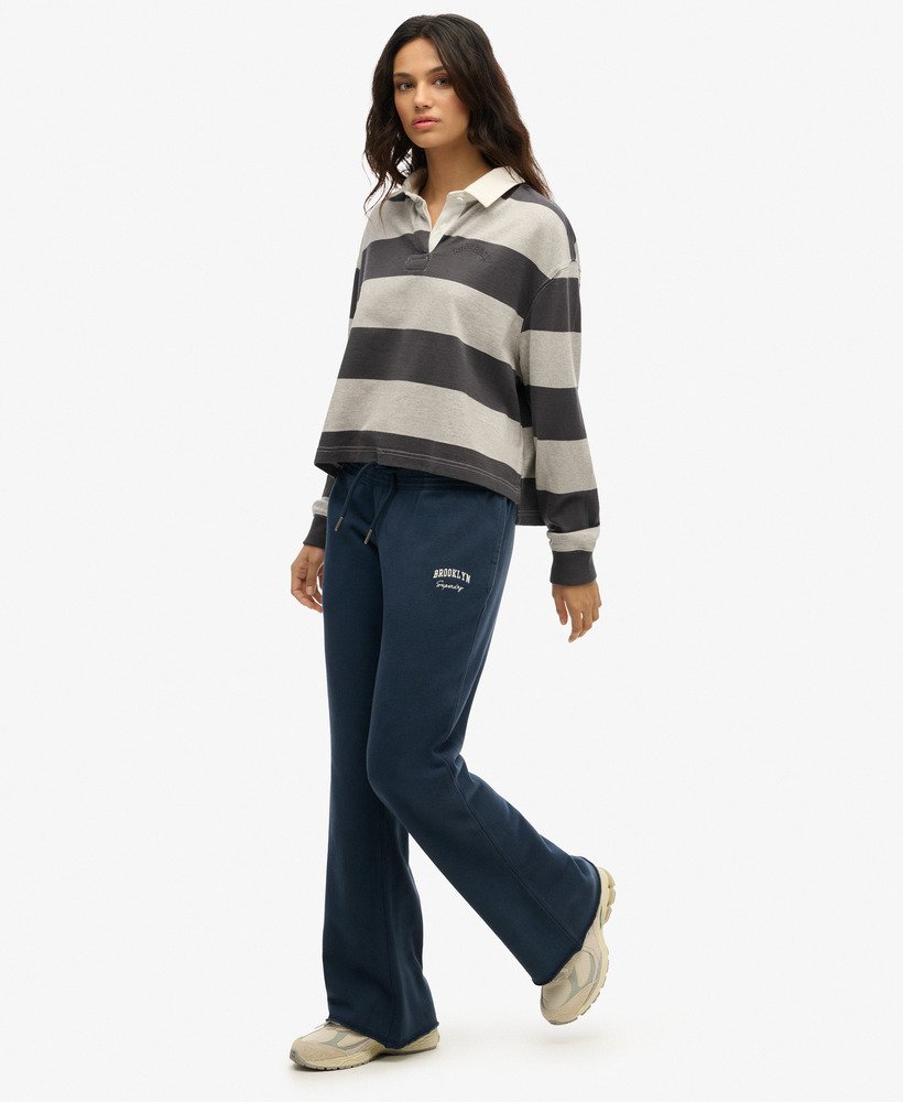 calça jogger flare de cintura baixa athletic essentials na cor azul marinho intenso