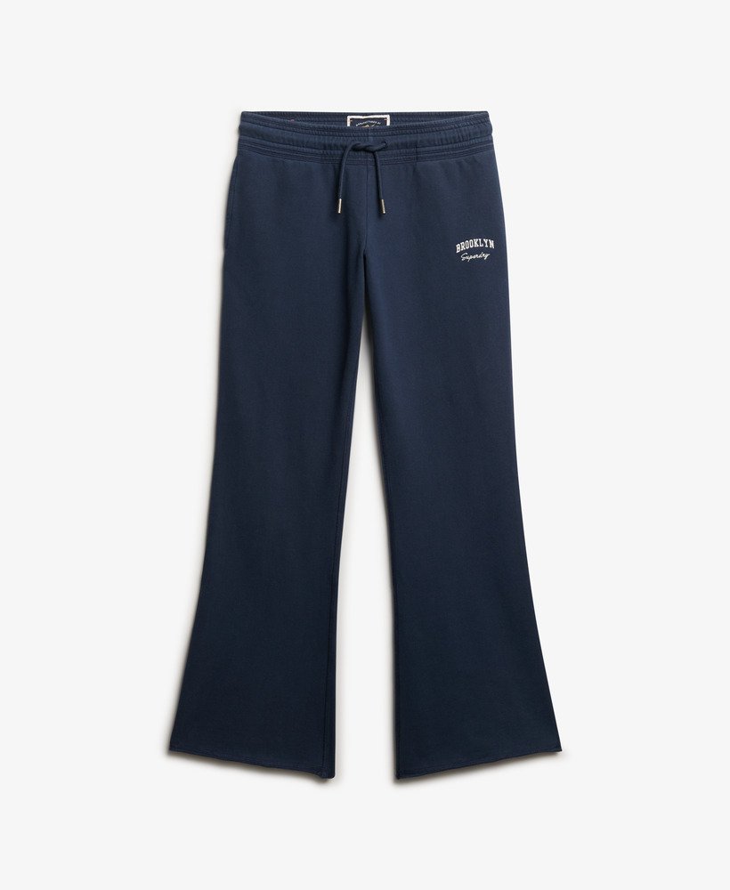 calça jogger flare de cintura baixa athletic essentials na cor azul marinho intenso